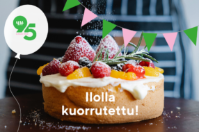 Syntymäpäiväkakku 4H:n logolla ja tekstillä "Ilolla kuorrutettu!"